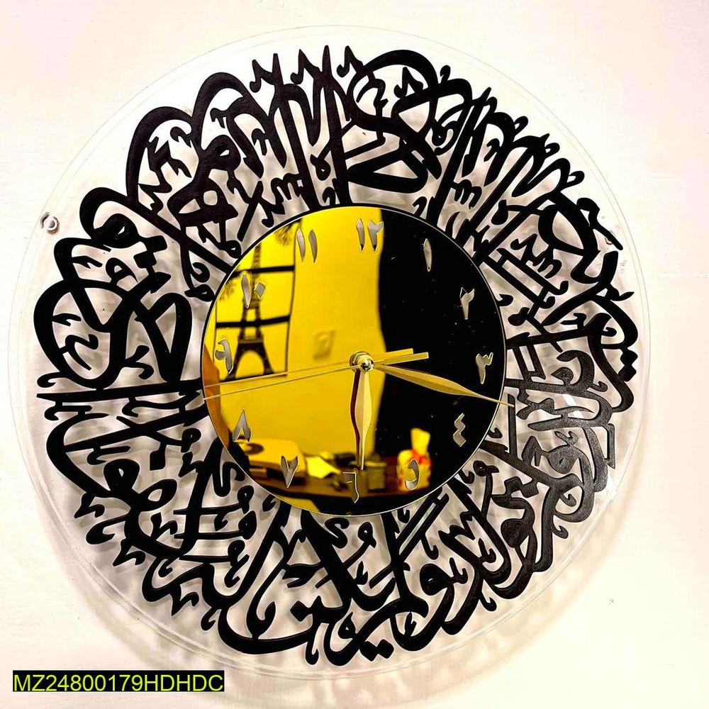 Decorative wall clock with black calligraphy design on a white background
